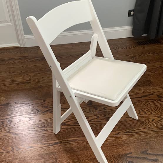 White resin padded folding wedding chair